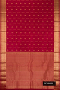 Maroon Dual Tone Kanchipuram Silk Saree with Zari Butta on the body and Zari Border.  displayed on a mannequin