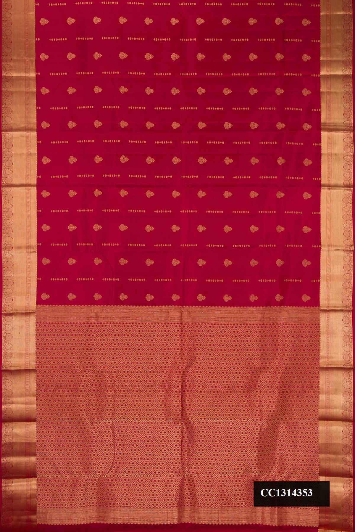 Maroon Dual Tone Kanchipuram Silk Saree with Zari Butta on the body and Zari Border.  displayed on a mannequin