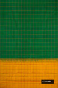 Bottle Green Dual Tone Kanchipuram Silk Saree with Checked design on the body and Without Border.  displayed on a mannequin