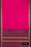 Magenta Dual Tone Kanchipuram Silk Saree with Zari Butta on the body and Zari Border.  displayed on a mannequin