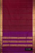 Maroon Dual Tone Kanchipuram Silk Saree with Plain Body and Zari Border.  displayed on a mannequin