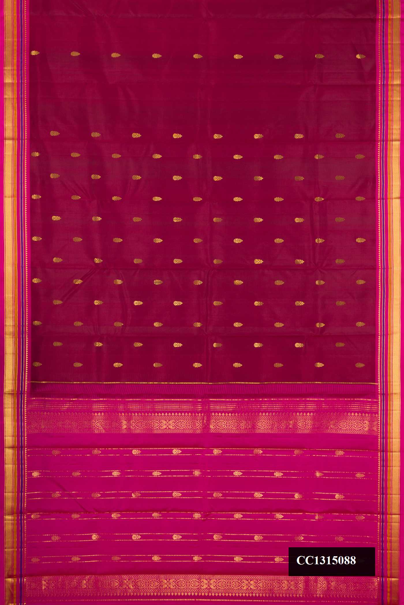Maroon Dual Tone Kanchipuram Silk Saree with Zari Butta on the body and Zari Border.  displayed on a mannequin