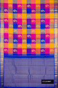 Multi Dual Tone Kanchipuram Silk Saree with Checked design on the body and Zari Border.  displayed on a mannequin