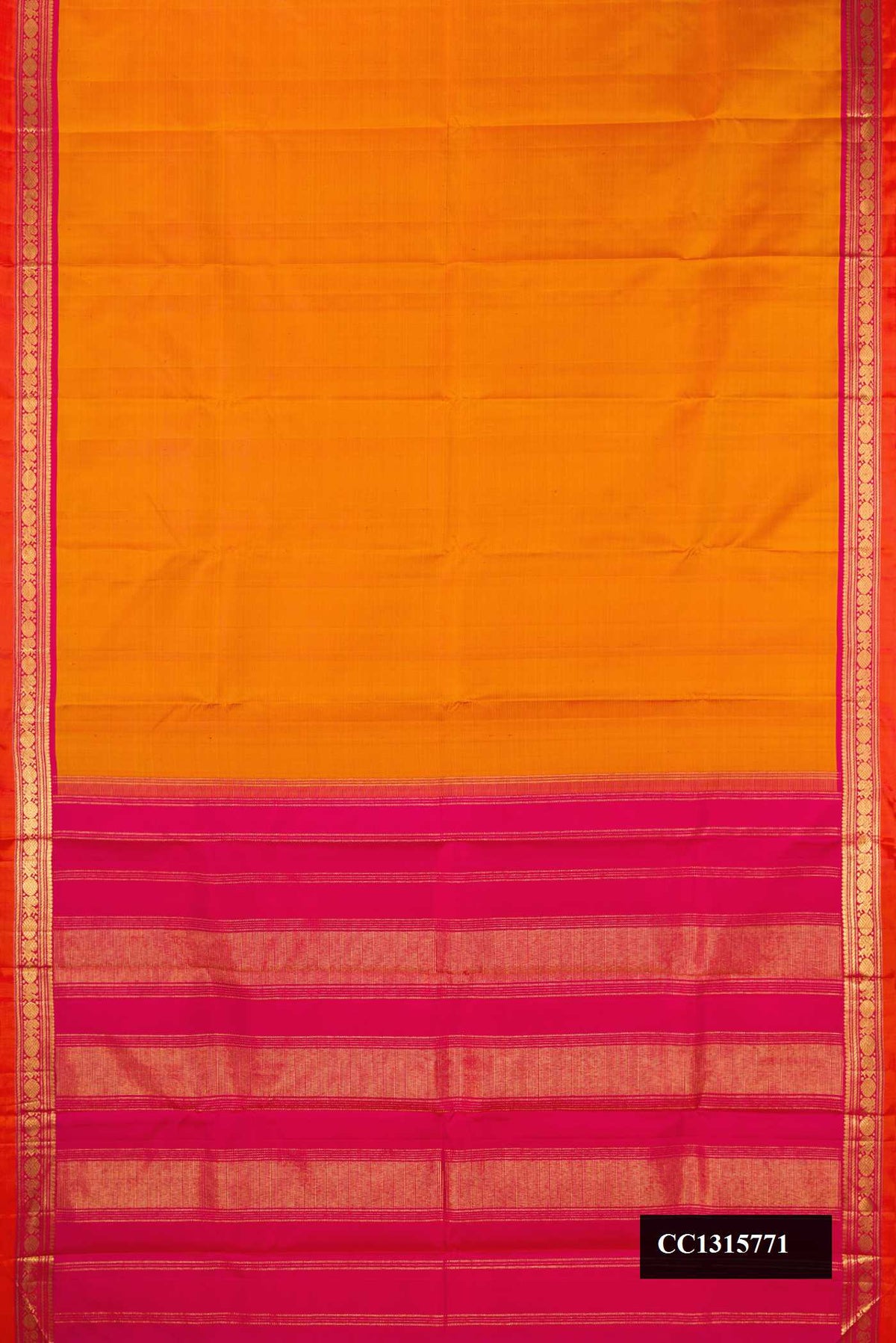 Mustard Dual Tone Kanchipuram Silk Saree with Stripes on the body and Zari Border.  displayed on a mannequin