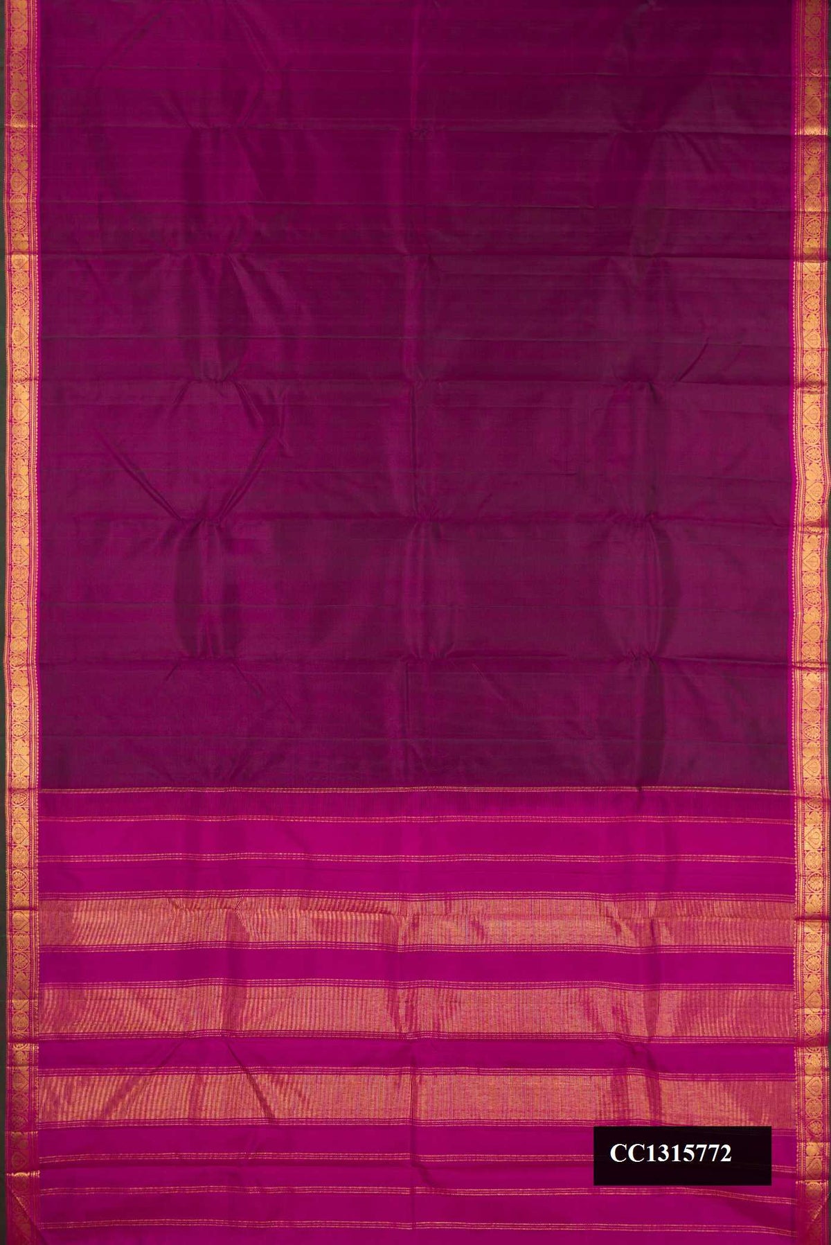 Purple Dual Tone Kanchipuram Silk Saree with Plain Body and Zari Border.  displayed on a mannequin
