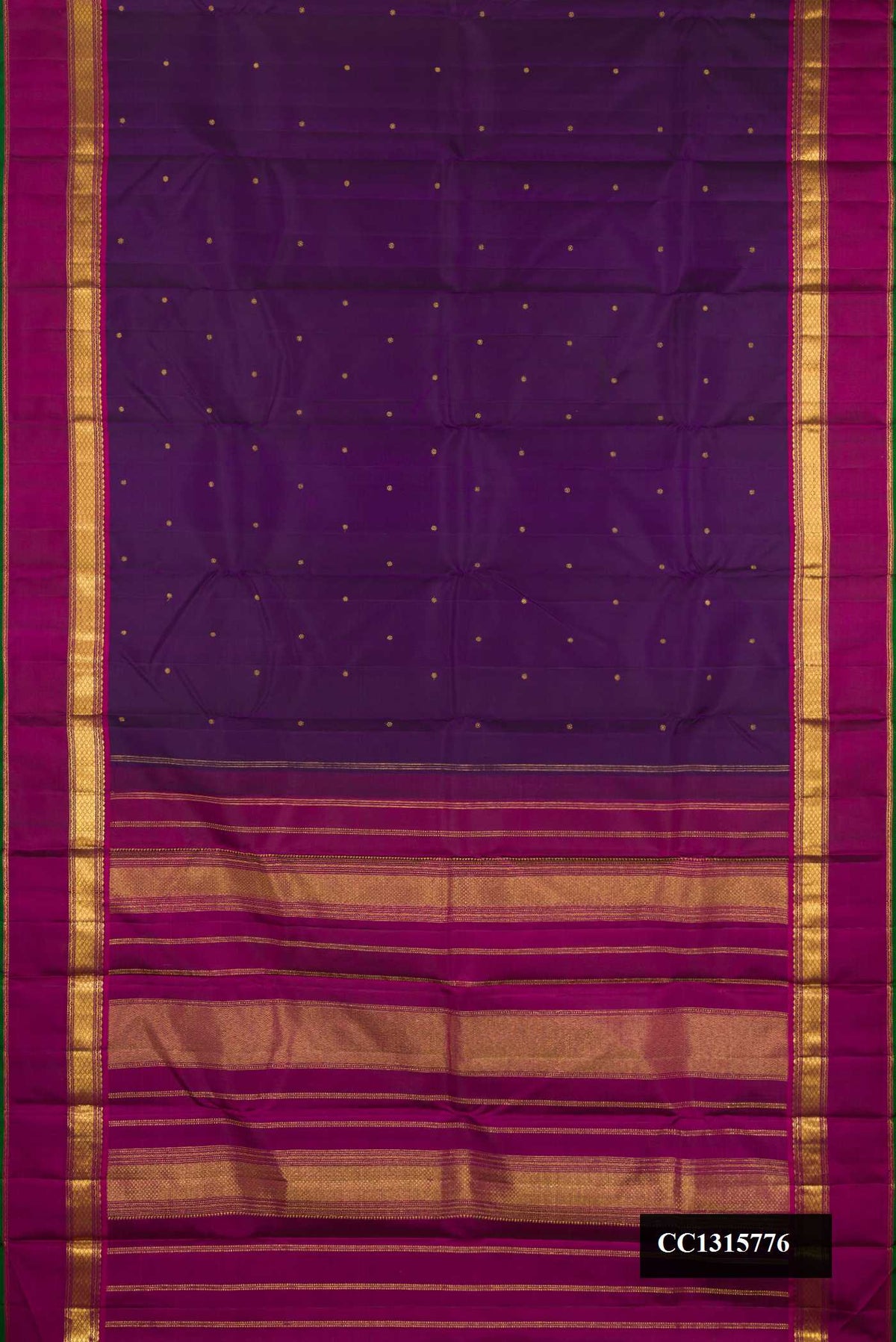 Violet Dual Tone Kanchipuram Silk Saree with Zari Butta on the body and Zari Border.  displayed on a mannequin