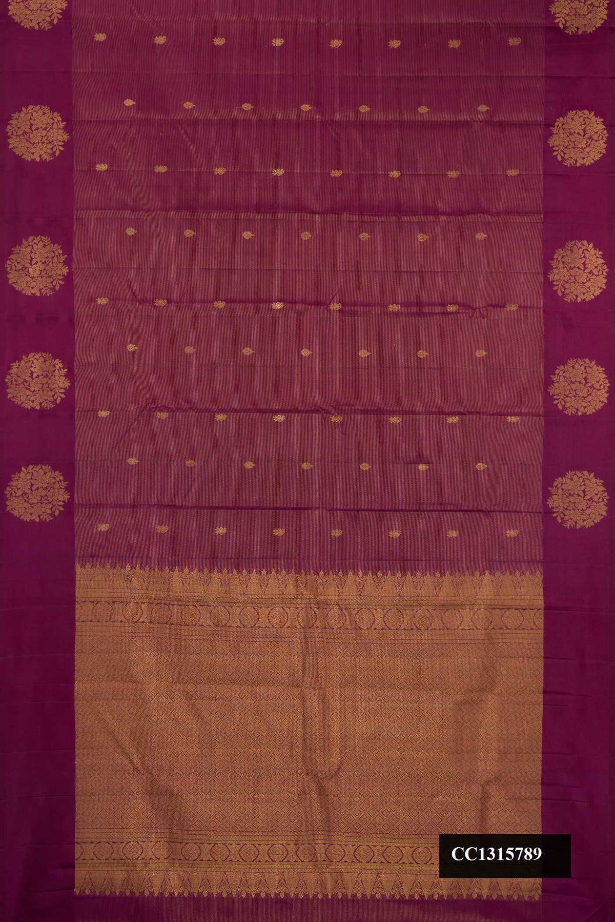 Burgundy Dual Tone Kanchipuram Silk Saree with Stripes on the body and Fancy Border.  displayed on a mannequin