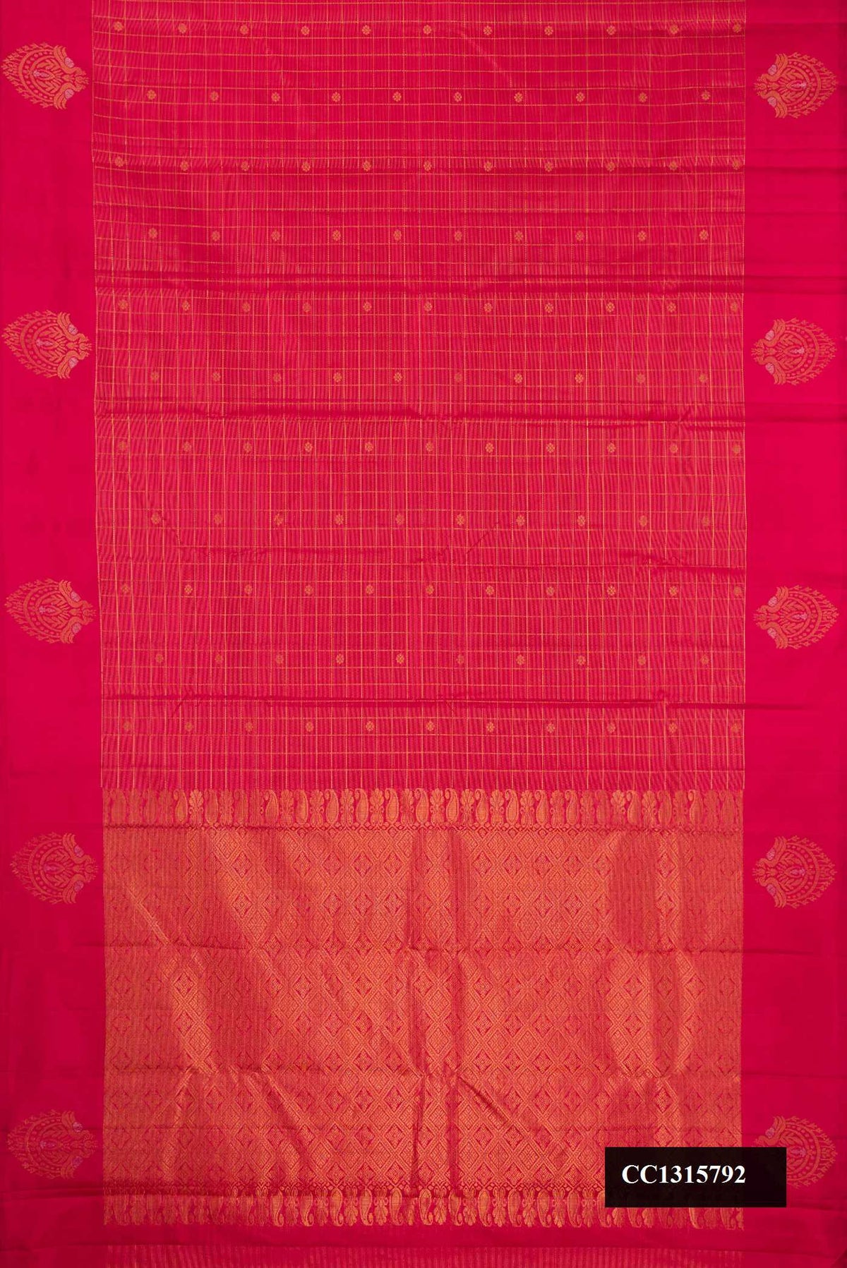 Maroon Dual Tone Kanchipuram Silk Saree with Checked design on the body and Fancy Border.  displayed on a mannequin
