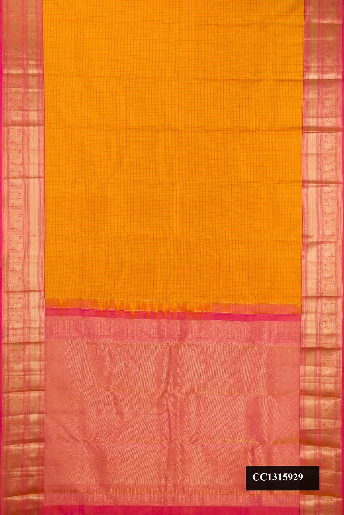 Mustard Dual Tone Kanchipuram Silk Saree with Checked design on the body and Zari Border.  displayed on a mannequin