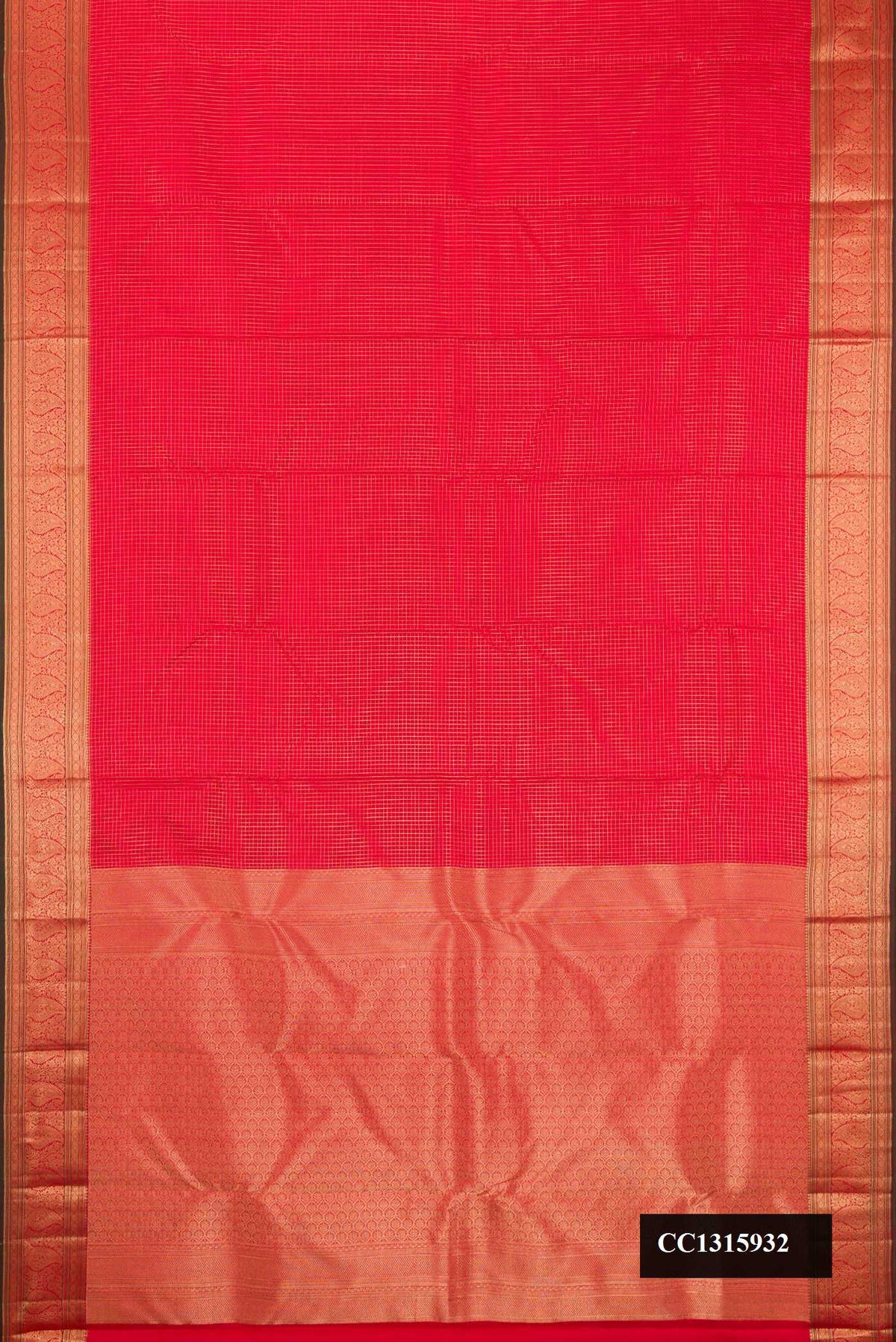 Red Dual Tone Kanchipuram Silk Saree with Checked design on the body and Zari Border.  displayed on a mannequin