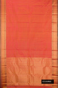 Coral Dual Tone Kanchipuram Silk Saree with Checked design on the body and Zari Border.  displayed on a mannequin