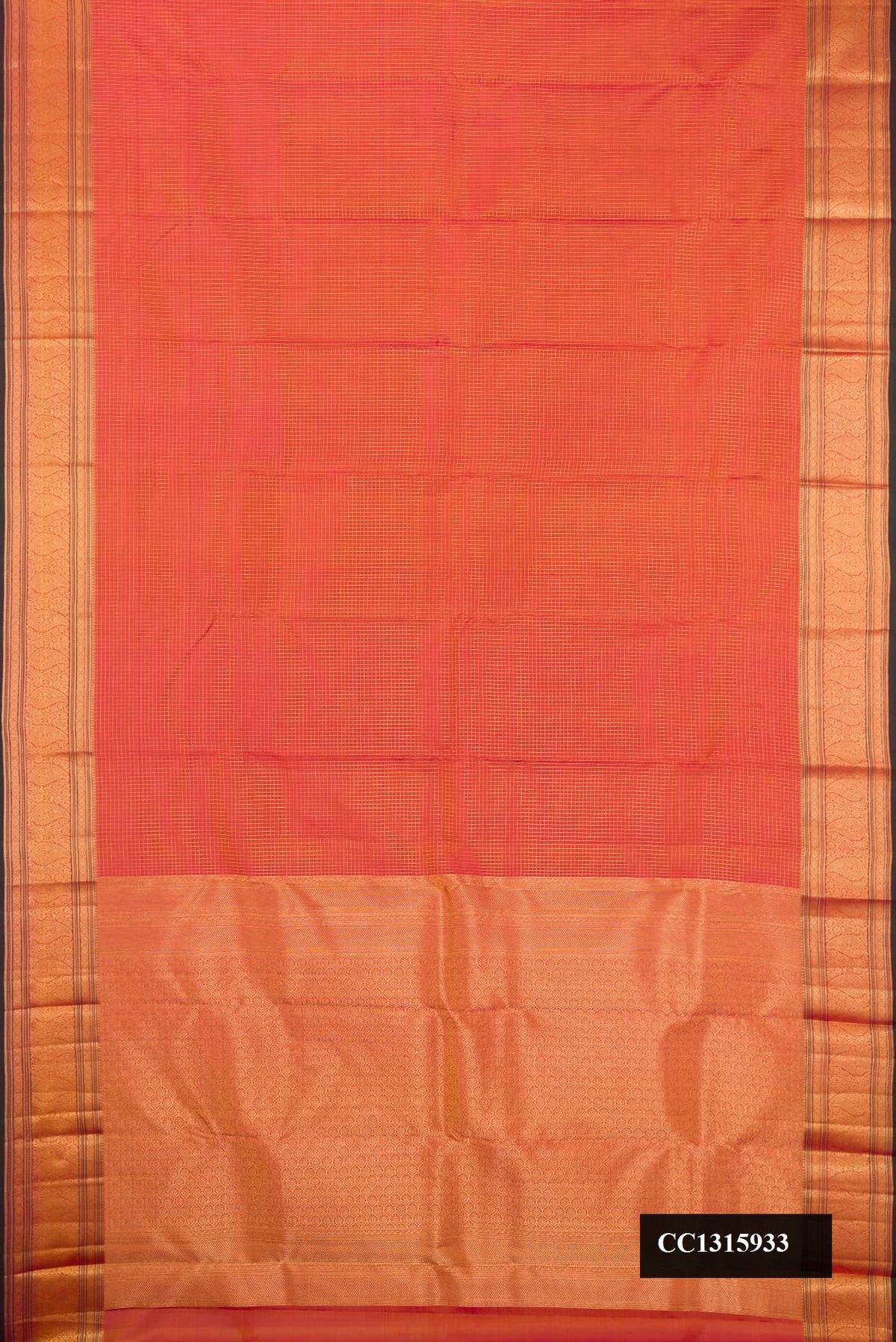 Coral Dual Tone Kanchipuram Silk Saree with Checked design on the body and Zari Border.  displayed on a mannequin