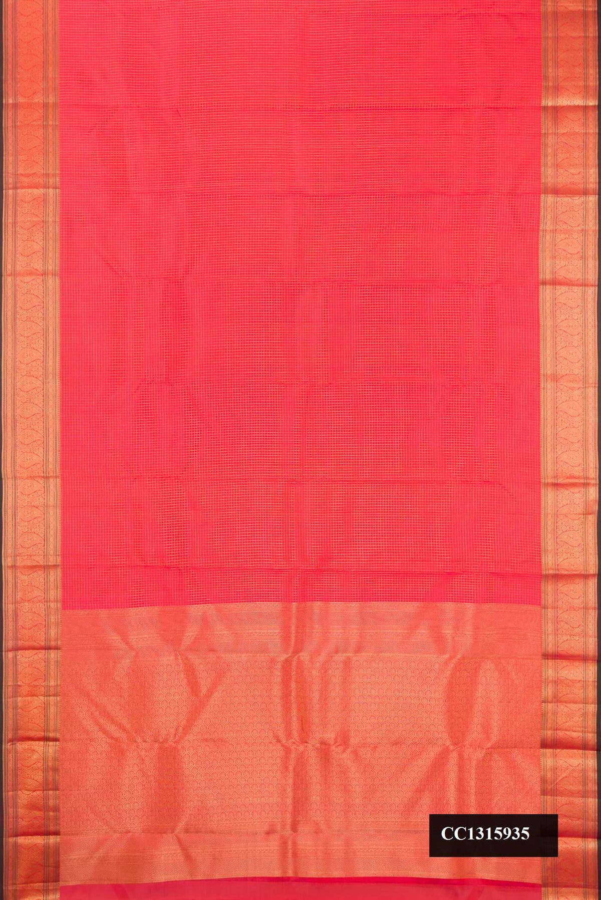 Coral Dual Tone Kanchipuram Silk Saree with Checked design on the body and Zari Border.  displayed on a mannequin
