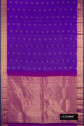 Royal Blue Dual Tone Kanchipuram Silk Saree with Stripes on the body and Zari Border.  displayed on a mannequin