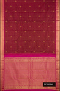 Maroon Dual Tone Kanchipuram Silk Saree with Stripes on the body and Zari Border.  displayed on a mannequin