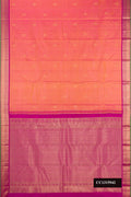 Coral Dual Tone Kanchipuram Silk Saree with Zari Butta on the body and Zari Border.  displayed on a mannequin