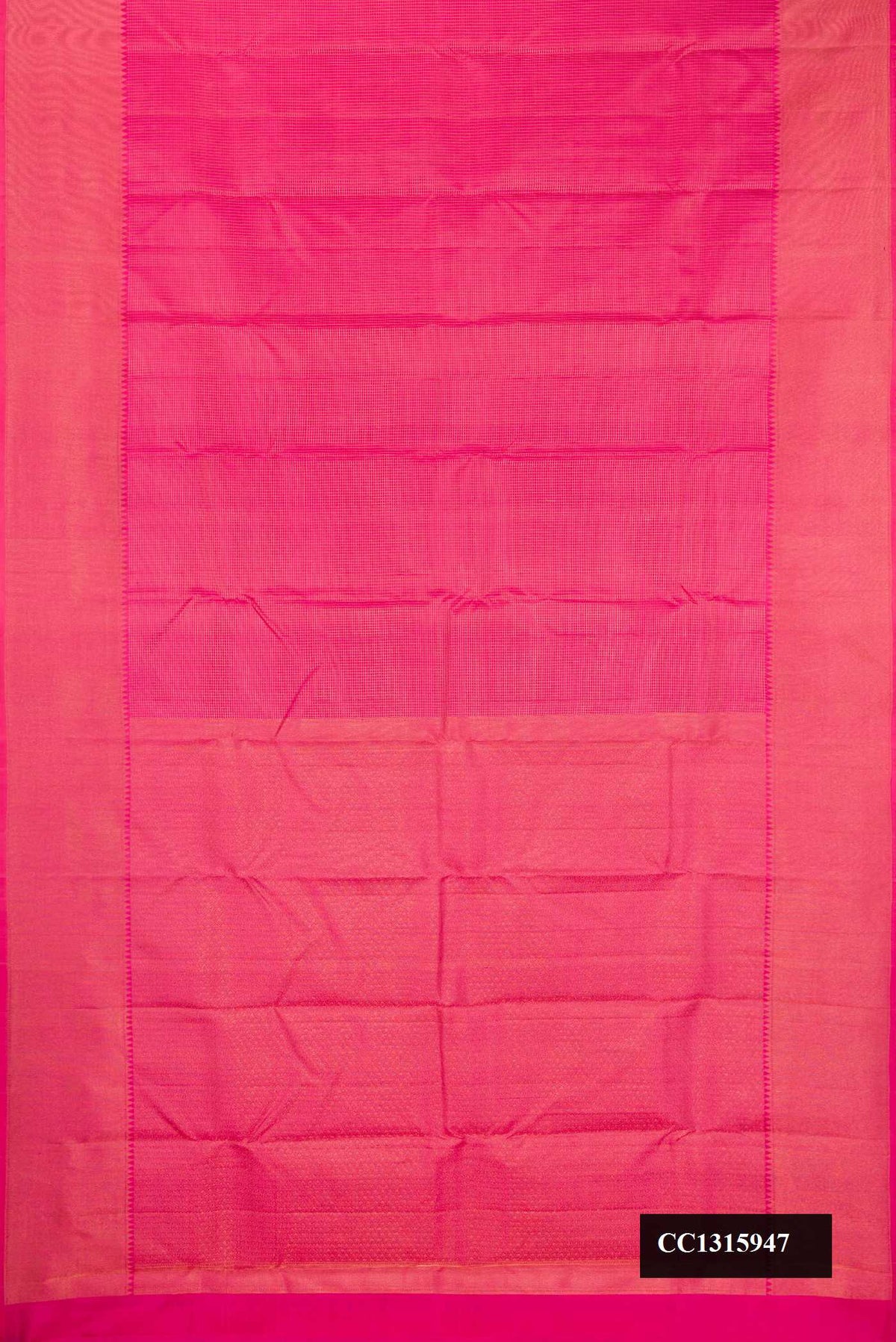 Dark Pink Dual Tone Kanchipuram Silk Saree with Checked design on the body and Zari Border.  displayed on a mannequin