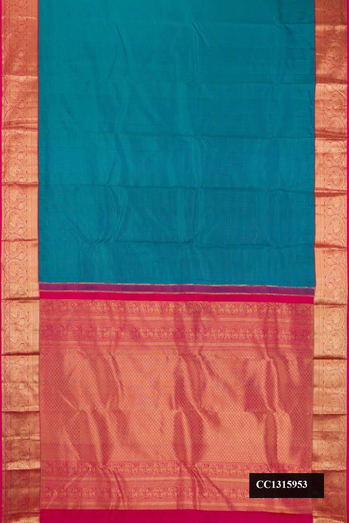 Peacock Blue Dual Tone Kanchipuram Silk Saree with Stripes on the body and Zari Border.  displayed on a mannequin