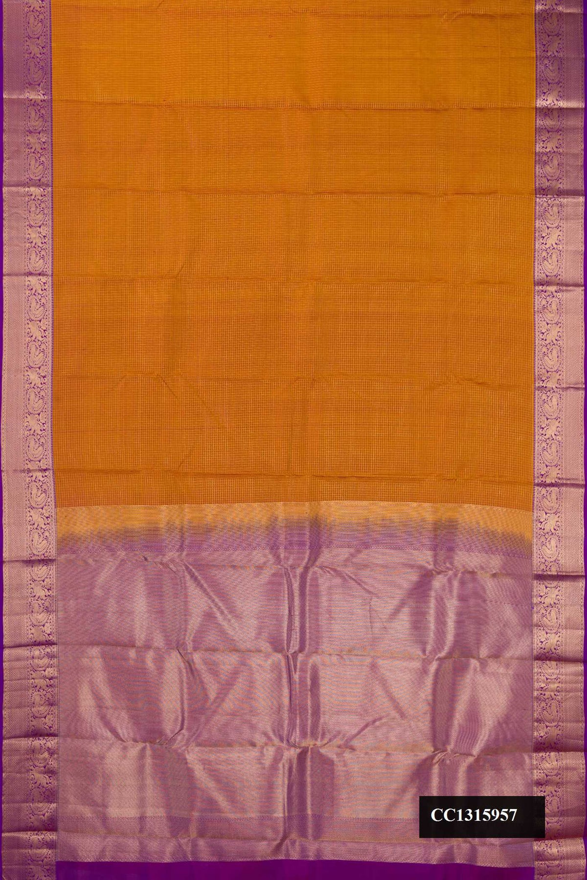 Mustard Dual Tone Kanchipuram Silk Saree with Checked design on the body and Zari Border.  displayed on a mannequin