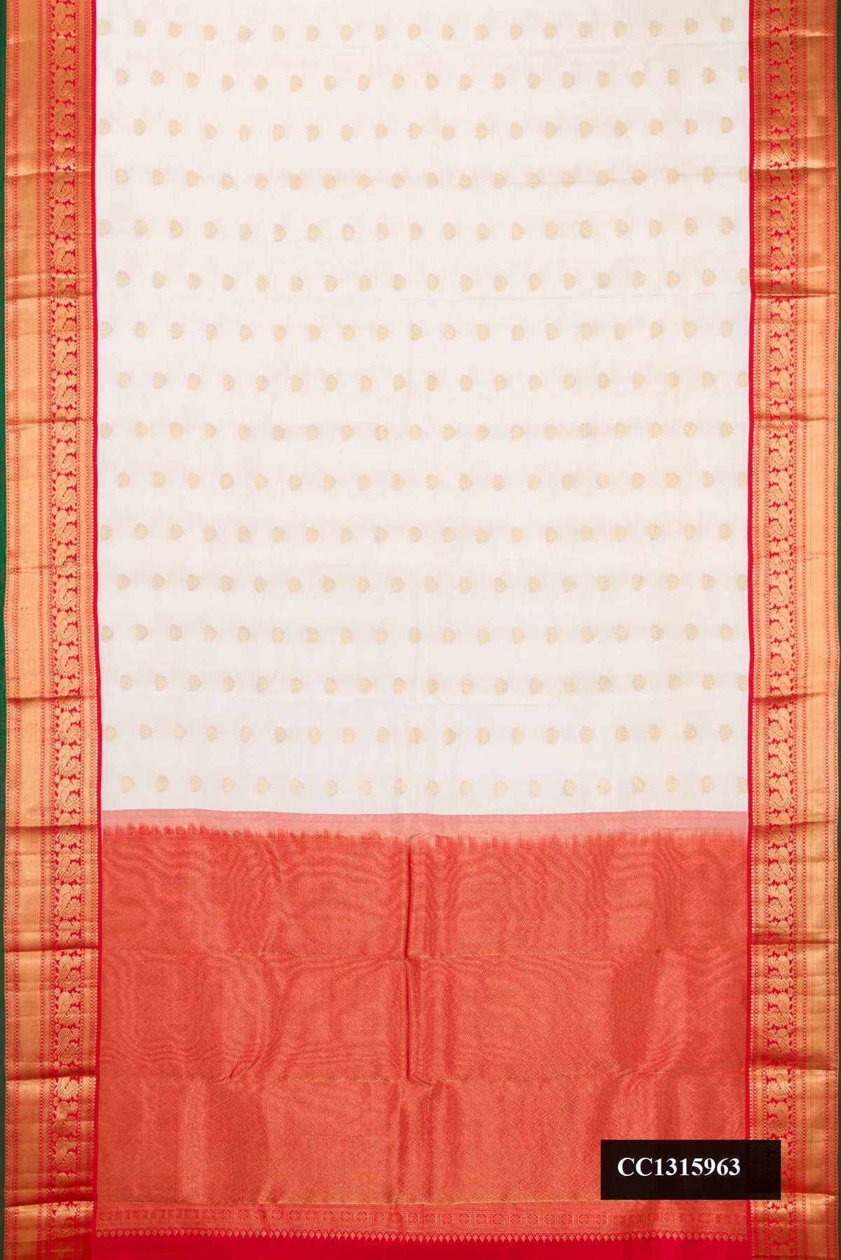 White Dual Tone Kanchipuram Silk Saree with Zari Butta on the body and Zari Border.  displayed on a mannequin