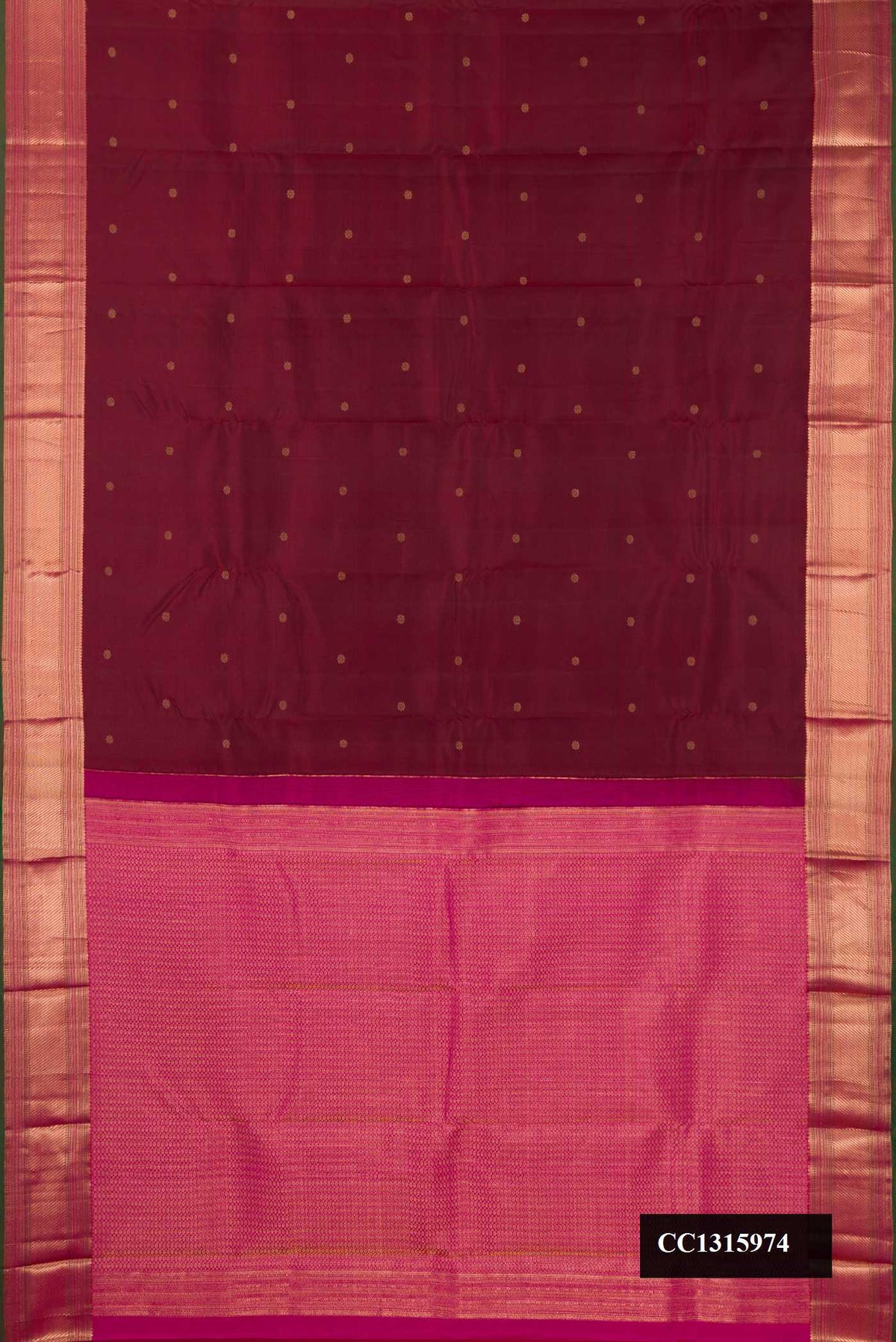 Maroon Dual Tone Kanchipuram Silk Saree with Zari Butta on the body and Zari Border.  displayed on a mannequin