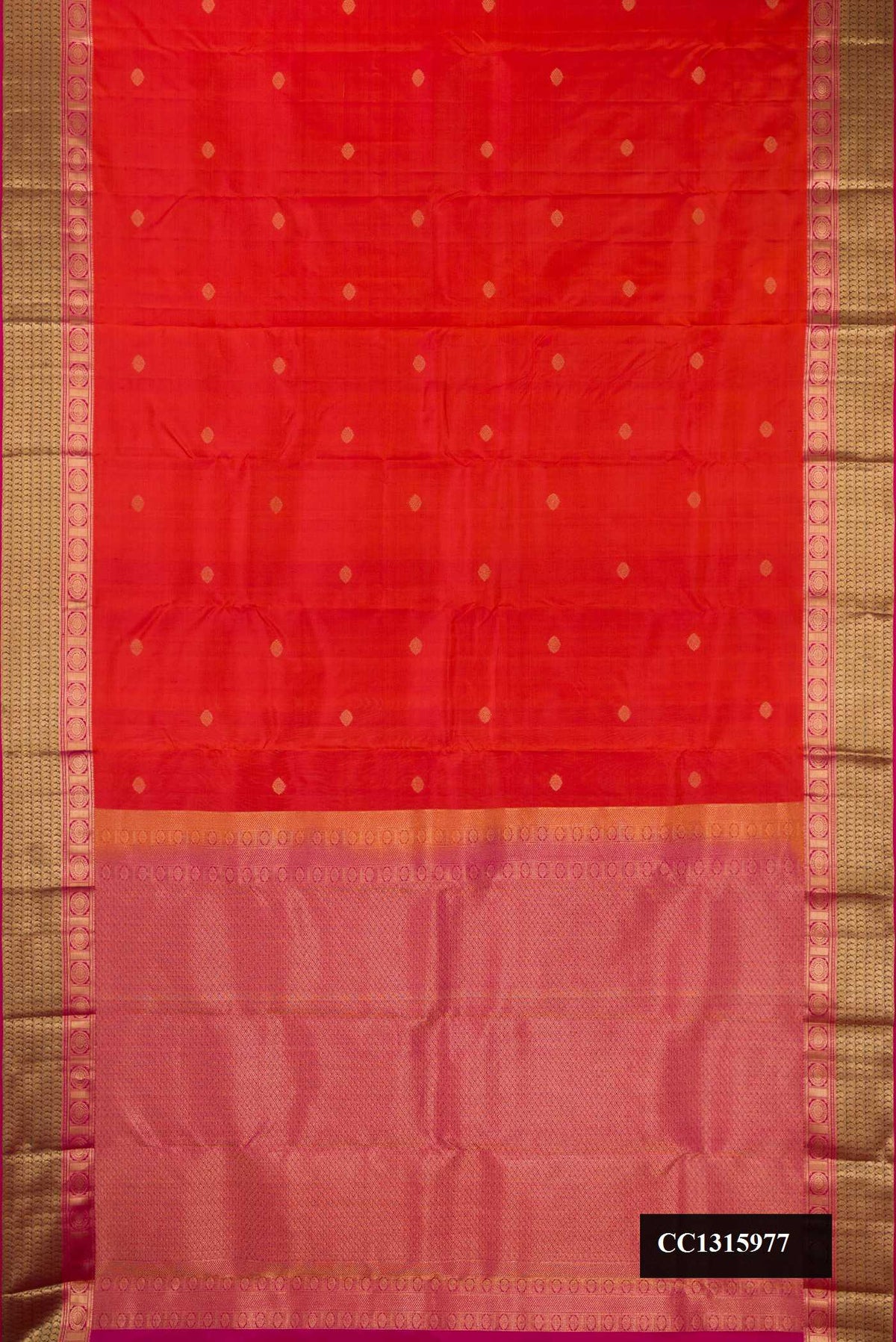 Orange Dual Tone Kanchipuram Silk Saree with Zari Butta on the body and Zari Border.  displayed on a mannequin