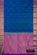 Peacock Blue Dual Tone Kanchipuram Silk Saree with Zari Butta on the body and Zari Border.  displayed on a mannequin