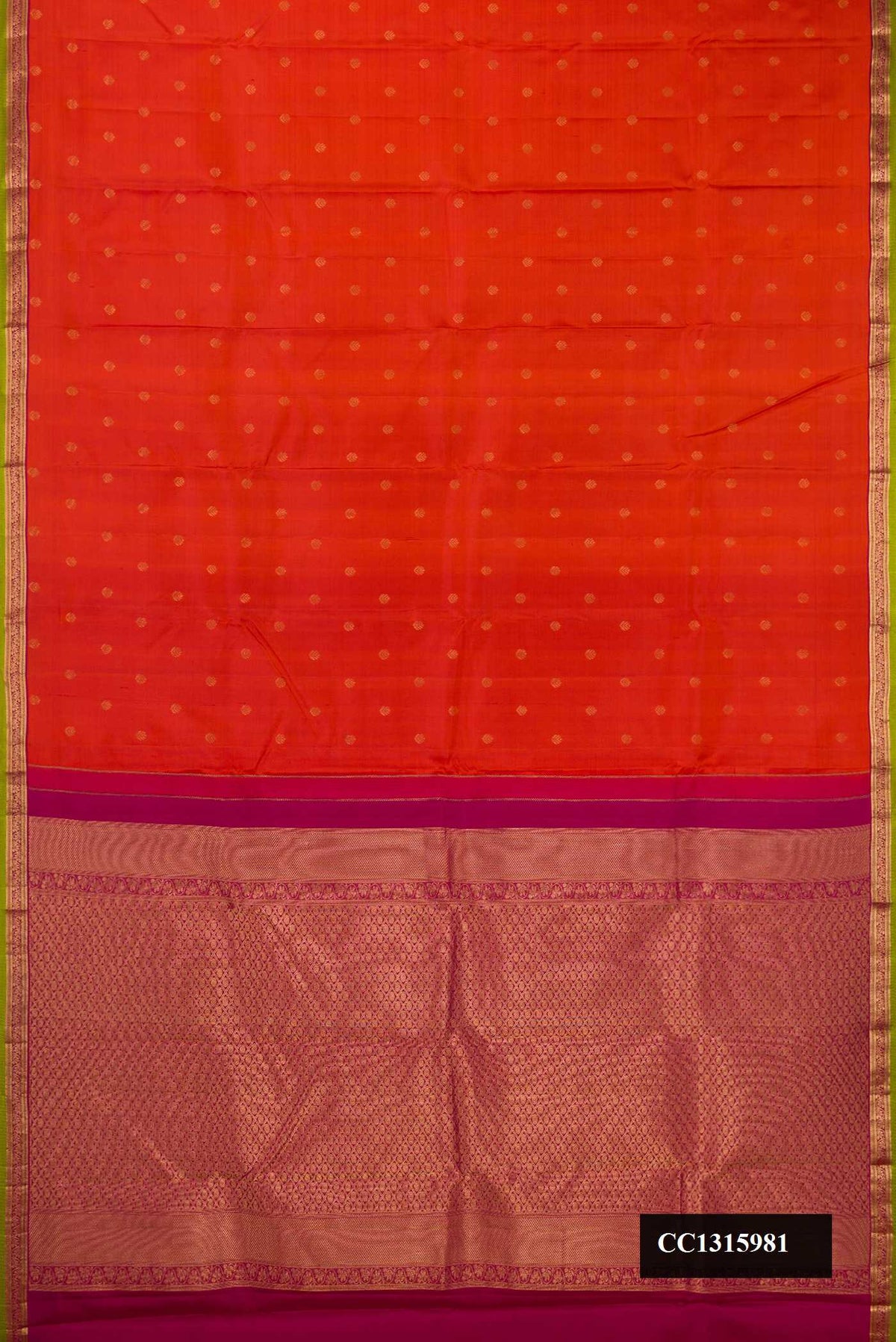 Orange Dual Tone Kanchipuram Silk Saree with Zari Butta on the body and Zari Border.  displayed on a mannequin