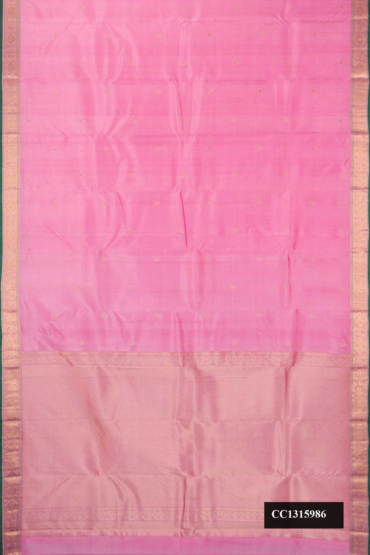 Pink Dual Tone Kanchipuram Silk Saree with Zari Butta on the body and Zari Border.  displayed on a mannequin