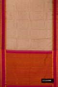 Dark Beige Dual Tone Kanchipuram Silk Saree with Checked design on the body and Thread Border.  displayed on a mannequin