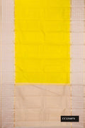 Lemon Yellow Dual Tone Kanchipuram Silk Saree with Zari Butta on the body and Fancy Border.  displayed on a mannequin