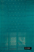 Peacock Blue Dual Tone Soft Silk Saree with Zari Butta on the body and Fancy Border.  displayed on a mannequin