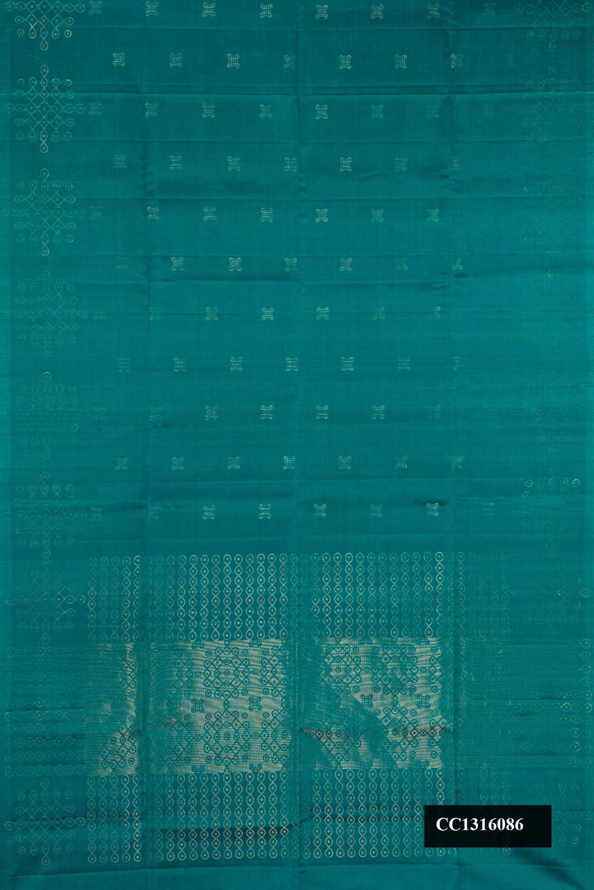 Peacock Blue Dual Tone Soft Silk Saree with Zari Butta on the body and Fancy Border.  displayed on a mannequin
