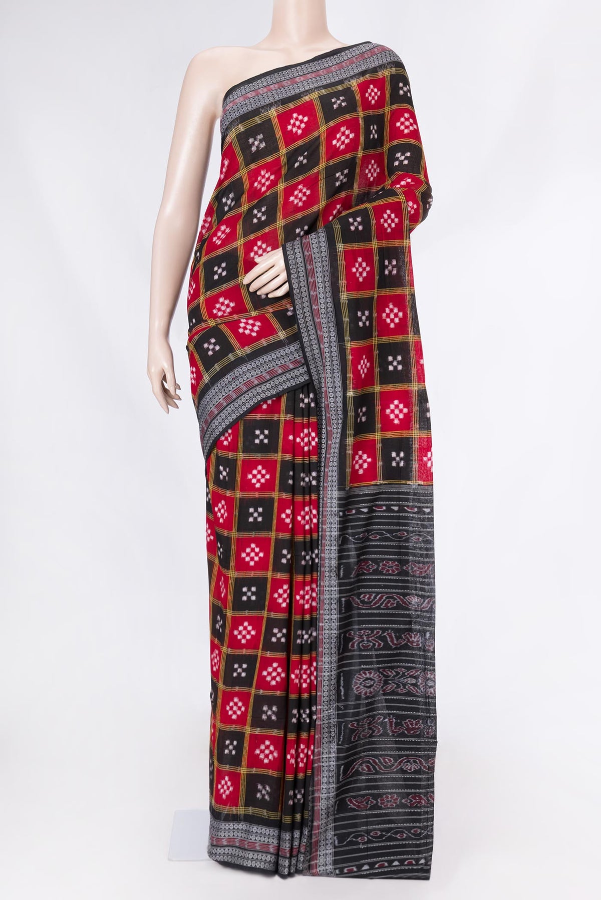 Red and Black Color Double Ikat Saree with Ikat Print on the body and Thread Border displayed on a mannequin
