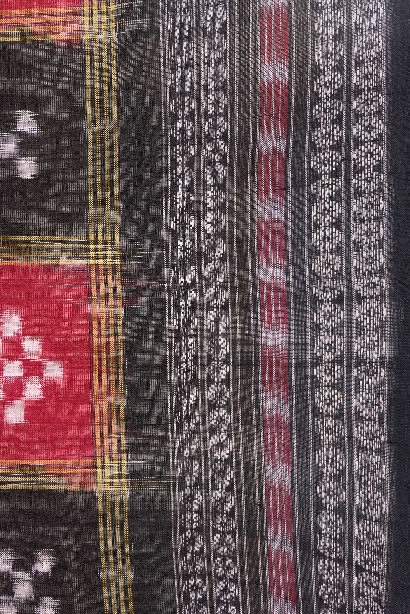 Border image of Black and Maroon Color Double Ikat Saree with Ikat Print on the body and Thread Border. 