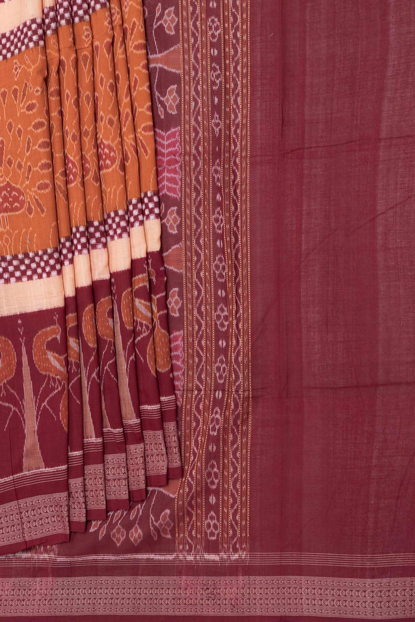 Pleats and pallu of Orange Dual Tone Double Ikat Saree with Ikat Print on the body and Ikat Border