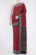 Maroon Dual Tone Double Ikat Saree with Ikat Print on the body and Thread Border.  displayed on a mannequin