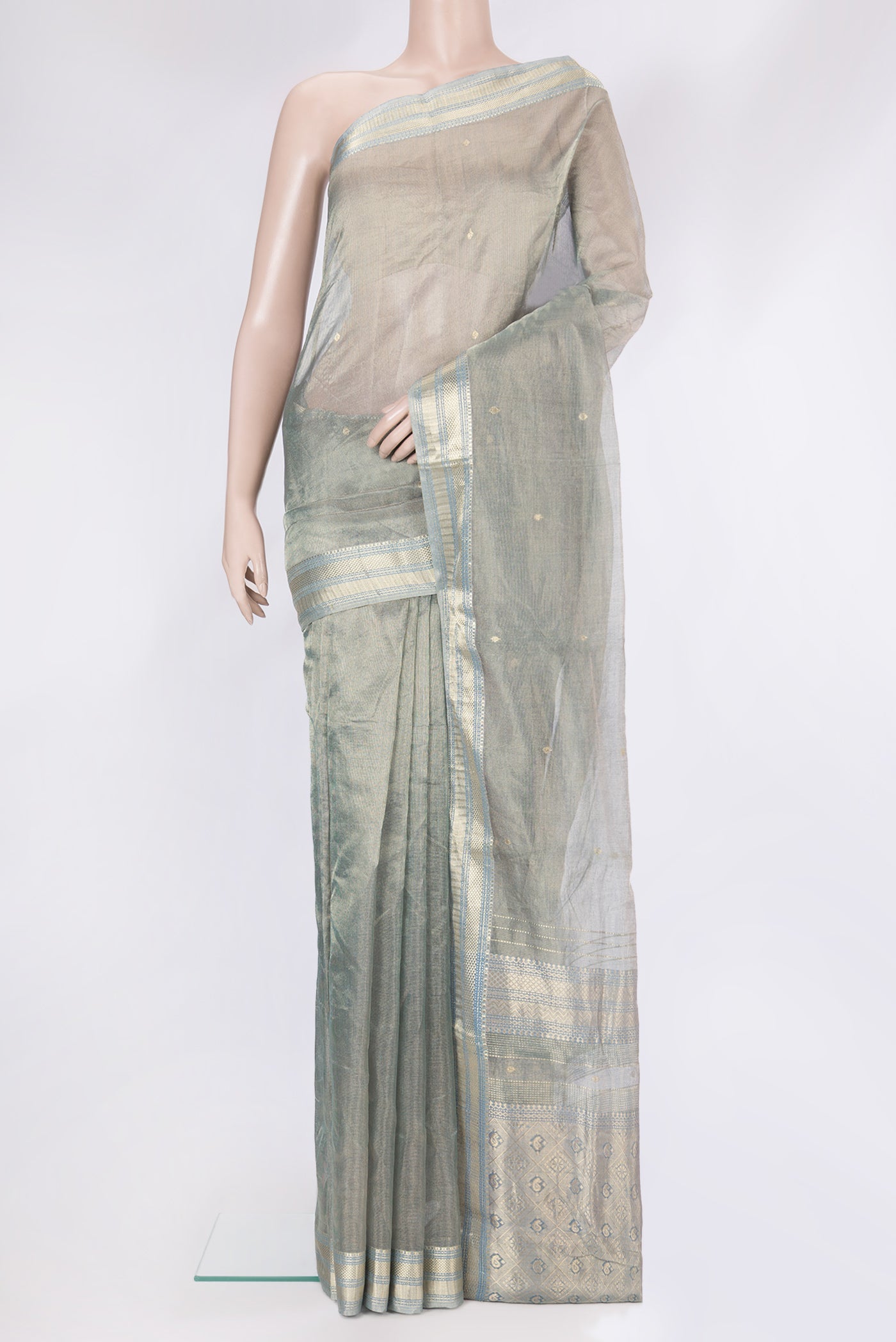 Grey Kota Silk Saree with Checked design on the body and Zari Border.  displayed on a mannequin
