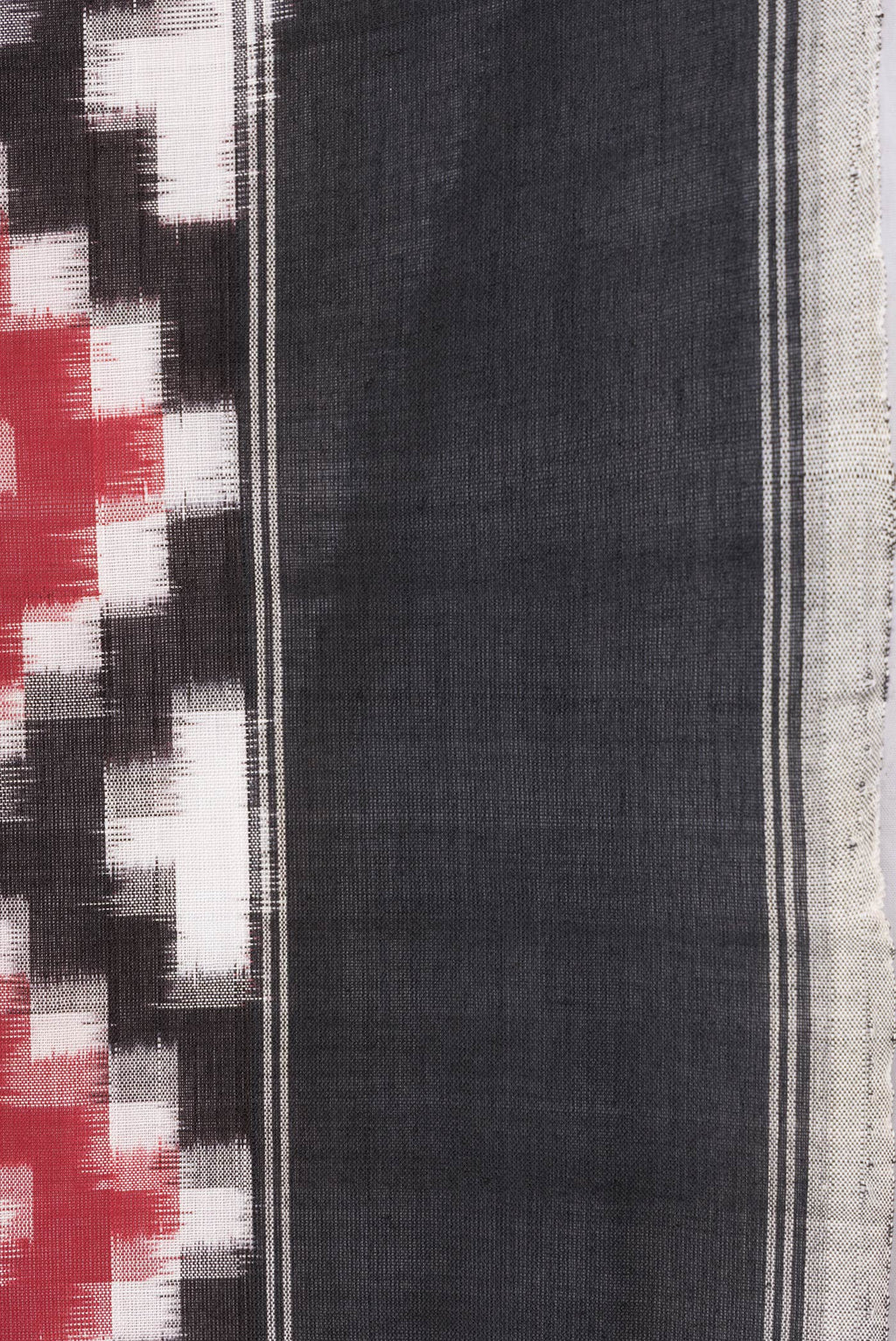 Border image of Black and Maroon Color Double Ikat Saree with Ikat Print on the body and Plain Border. 