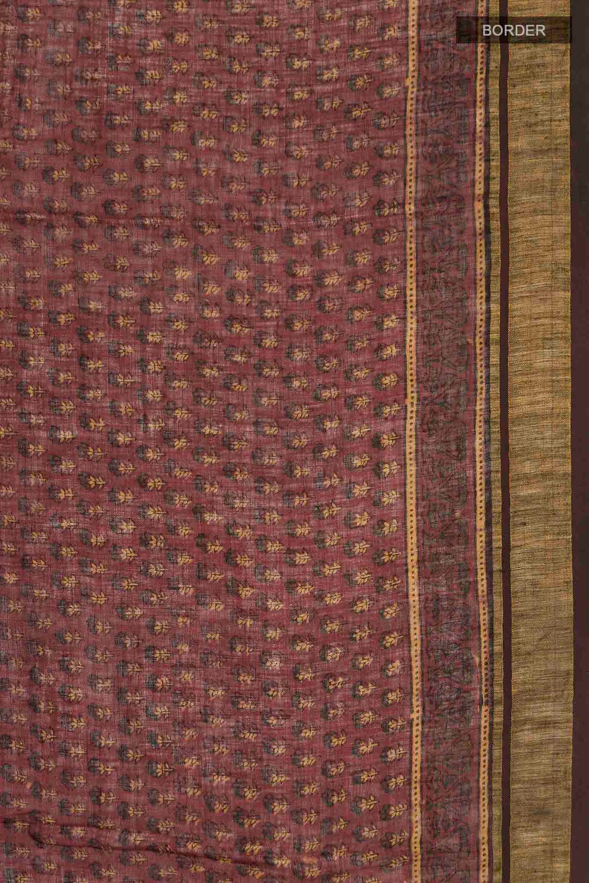 Border image of Rust Kalamkari Cotton Saree with Printed design on the body and Zari Border