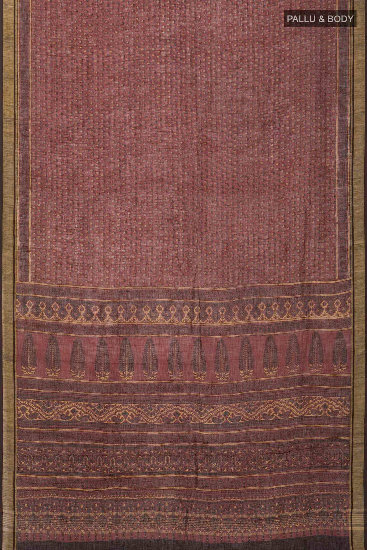 Flat view of Rust Kalamkari Cotton Saree with Printed design on the body and Zari Border