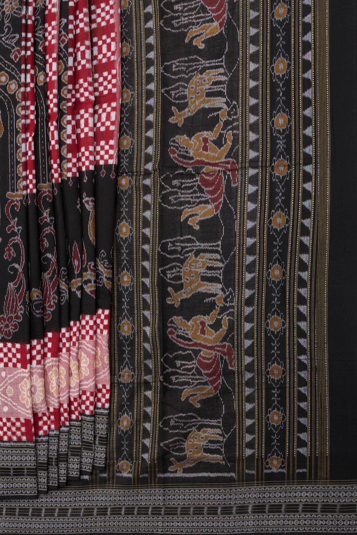 Pleats and pallu of Black and Maroon Color Double Ikat Saree with Ikat Print on the body and Thread Border. 