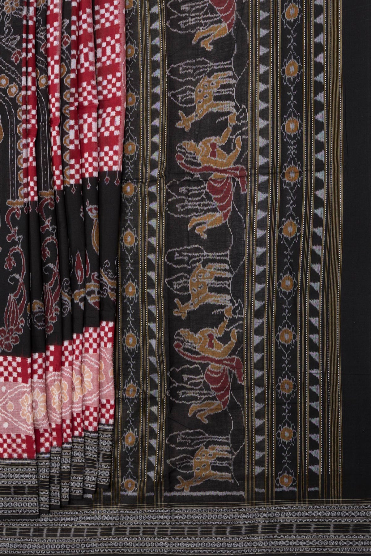 Pleats and pallu of Black and Maroon Color Double Ikat Saree with Ikat Print on the body and Thread Border. 