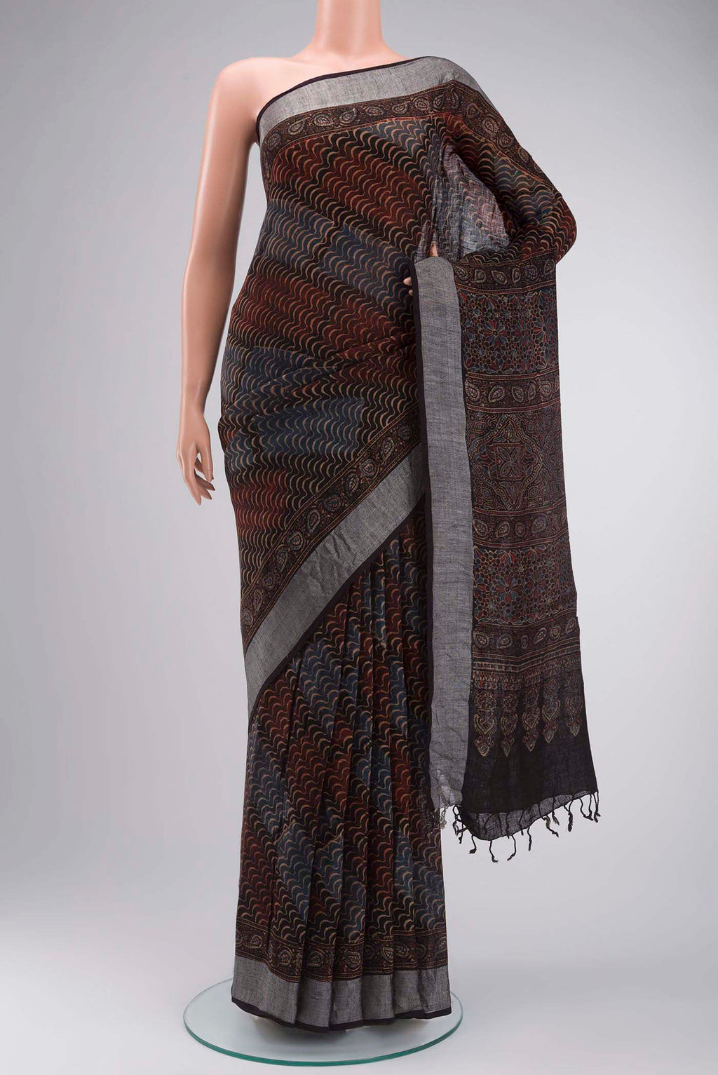 Black Bhagalpuri Tussar Silk Saree with Printed design on the body and Zari Border displayed on a mannequin