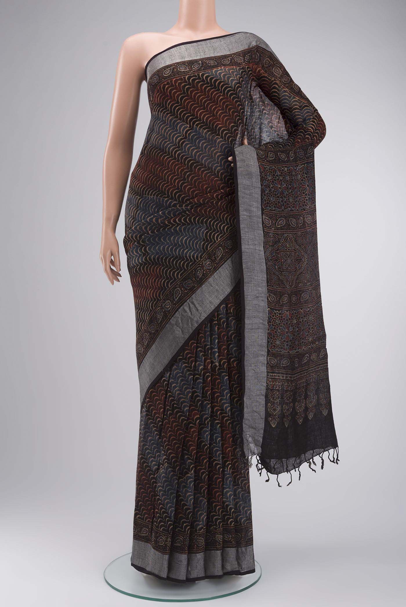 Black Bhagalpuri Tussar Silk Saree with Printed design on the body and Zari Border displayed on a mannequin