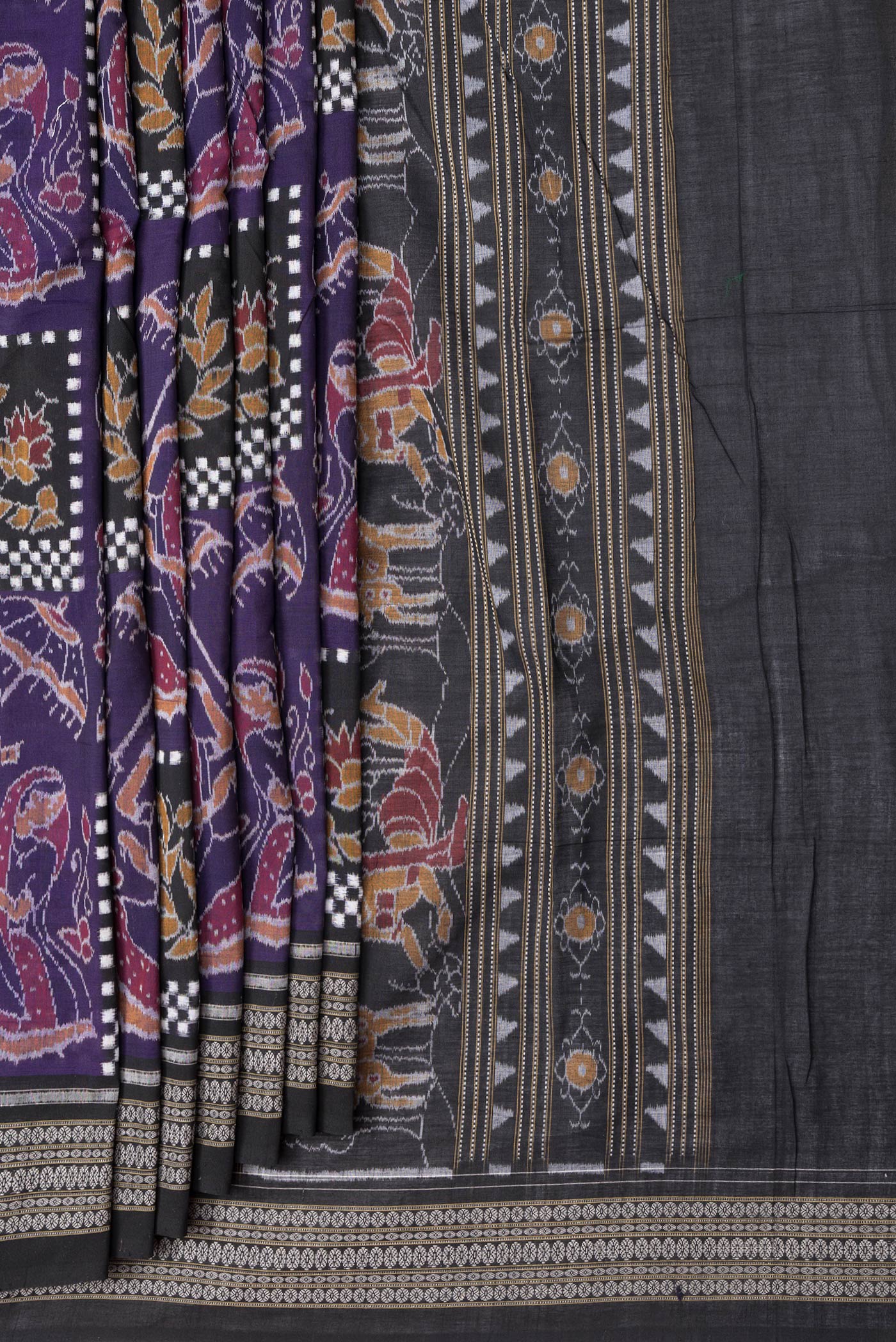 Pleats and pallu of Purple Dual Tone Double Ikat Saree with Ikat Print on the body and Thread Border. 