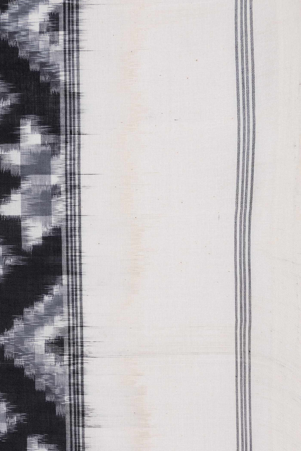 Border image of Black Dual Tone Double Ikat Saree with Ikat Print on the body and Plain Border