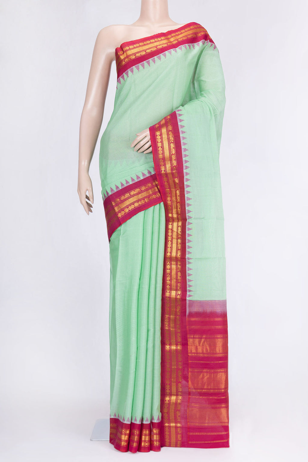 Pista Green Dual Tone Gadwal Silk Saree with Checked design on the body and Zari Border.  displayed on a mannequin