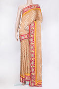 Beige Blended Satin Crepe Saree with Bandhani Print on the body and Printed Border.  displayed on a mannequin