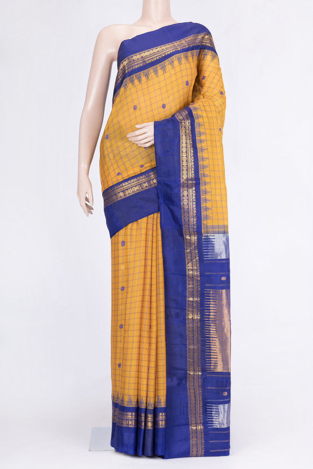 Mustard Dual Tone Gadwal Silk Saree with Zari And Thread Butta on the body and Zari Border.  displayed on a mannequin